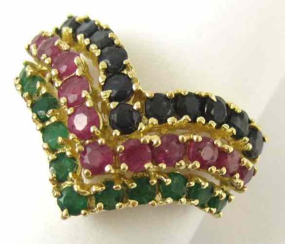 Appraisal: RUBY EMERALD AND SAPPHIRE RING k yellow gold set with