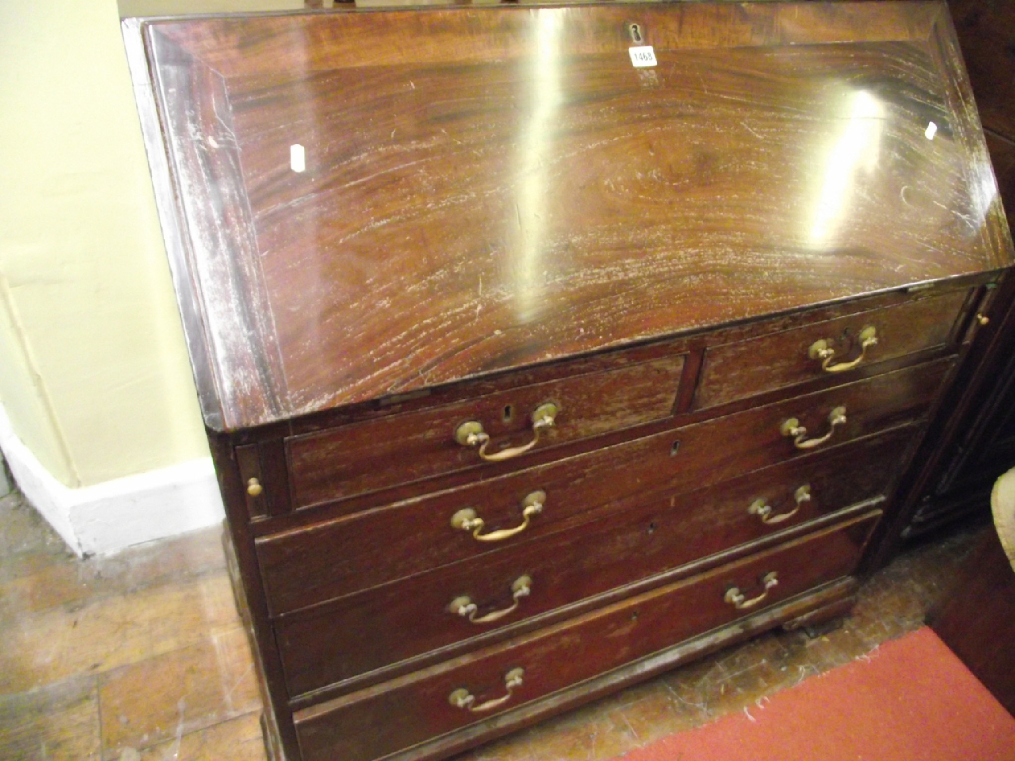 Appraisal: A substantial Georgian mahogany bureau of three long and two