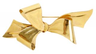 Appraisal: kt Bow Brooch polished bow form stamped with acorn on