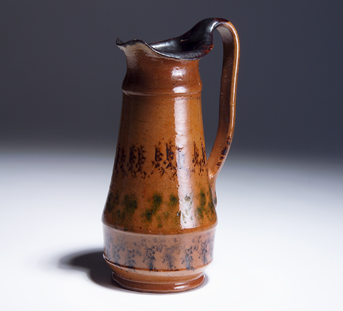 Appraisal: GEORGE OHR Tall pitcher sponge-painted with three bands in gunmetal