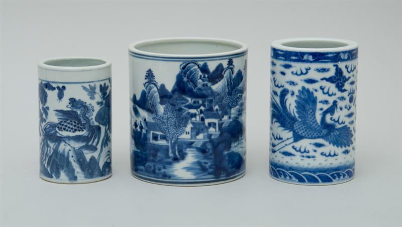 Appraisal: GROUP OF THREE CHINESE BLUE AND WHITE PORCELAIN CYLINDRICAL JARS