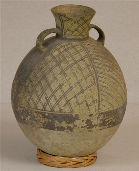 Appraisal: Peruvian Antique two handled pottery bottle with a lattice design