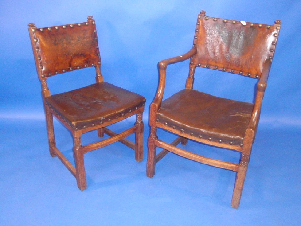 Appraisal: A set of five Gothic carved oak dining chairs with