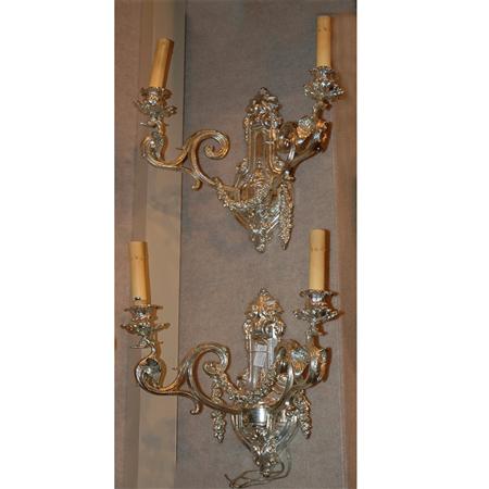 Appraisal: Pair of Louis XVI Style Silver Plated Three-Light Sconces Estimate