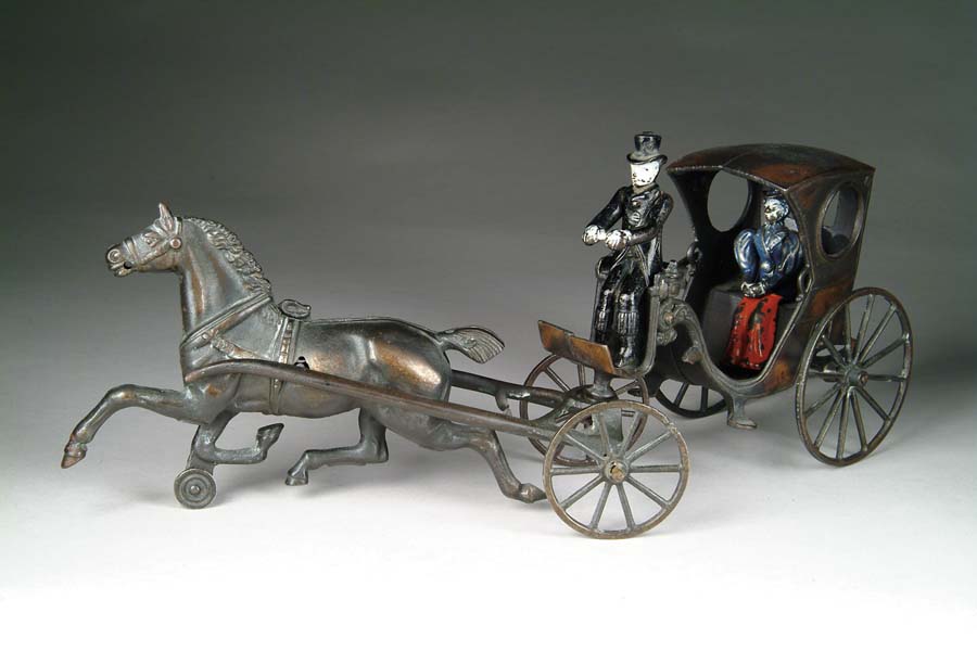 Appraisal: ELECTRO-PLATED CARRIAGE Manufactured by Kenton Mfg Co Horse carriage and