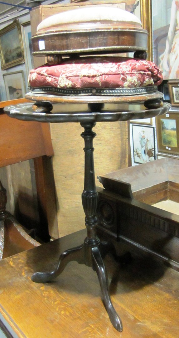 Appraisal: A th century mahogany occasional table and two circular foot