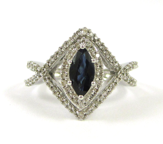 Appraisal: SAPPHIRE DIAMOND AND FOURTEEN KARAT GOLD RING The white gold