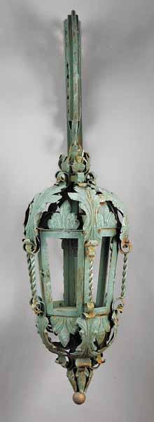 Appraisal: A Pair of Large Patinated Iron Lanterns with Brackets th