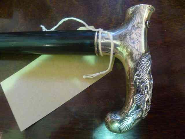 Appraisal: A TH CENTURY CHINESE SILVER HANDLED WALKING STICK decorated with