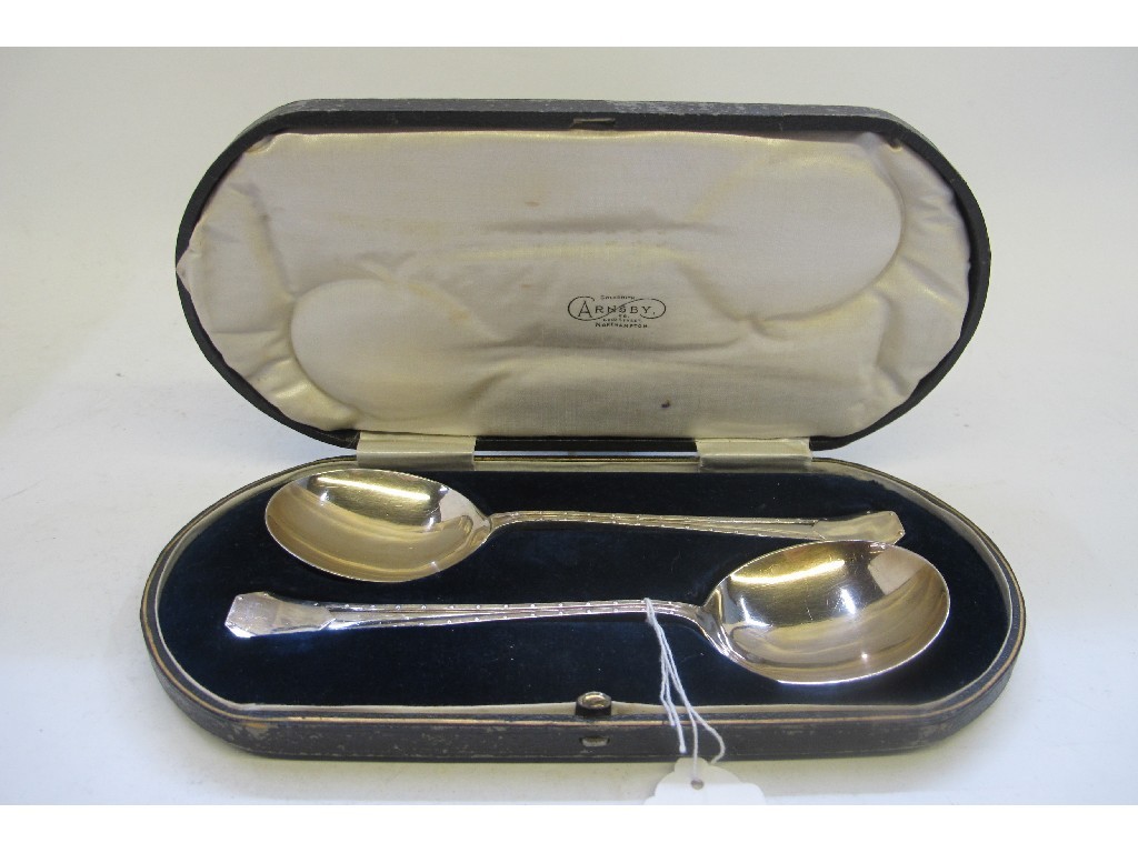 Appraisal: A cased pair of silver serving spoons Sheffield