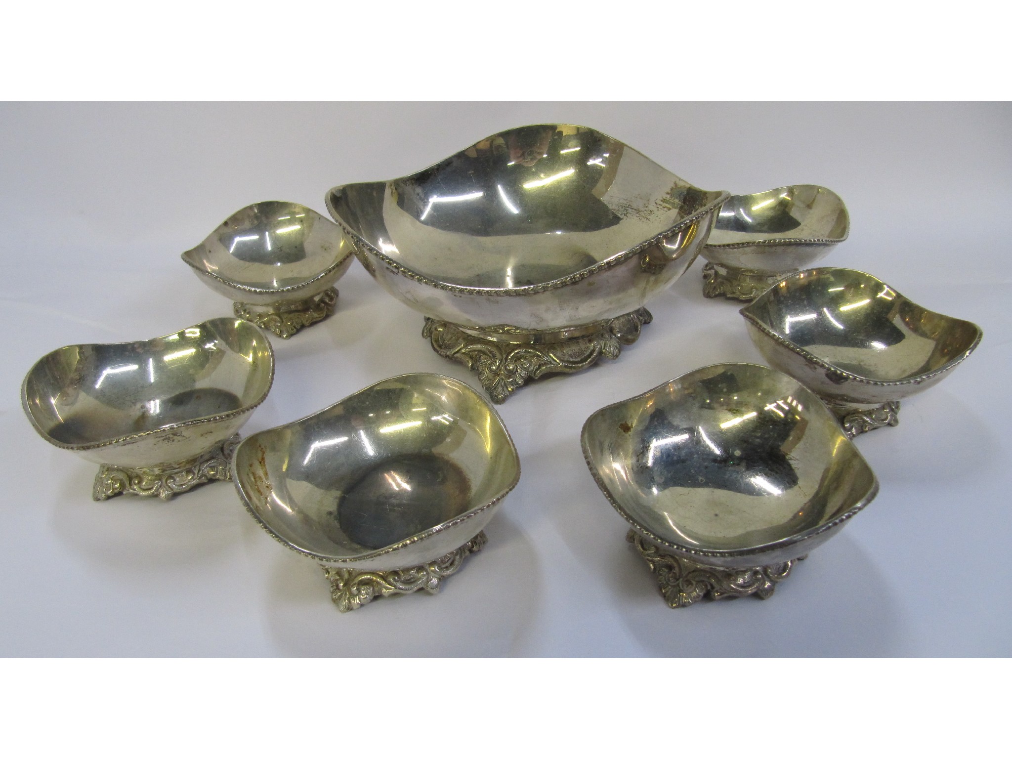 Appraisal: A seven piece white metal dessert set the bases marked