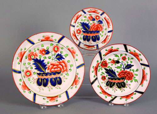 Appraisal: Three Gaudy Dutch plates th c in the war bonnet