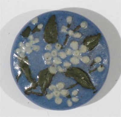 Appraisal: A Martin Brothers stoneware button slip painted with forget me