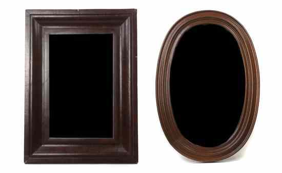 Appraisal: An Empire Mahogany Wall Mirror having an ogee frame centered