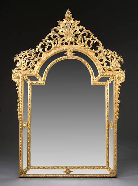 Appraisal: A Regence style carved giltwood and gesso mirror fourth quarter