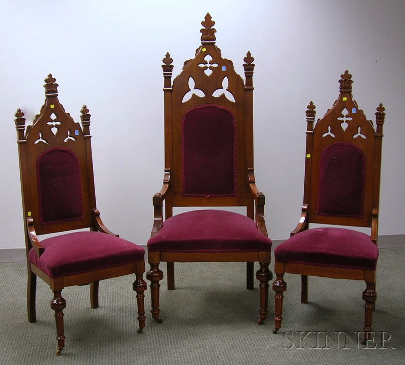 Appraisal: Set of Three Gothic-style Upholstered Carved Walnut Hall Chairs including