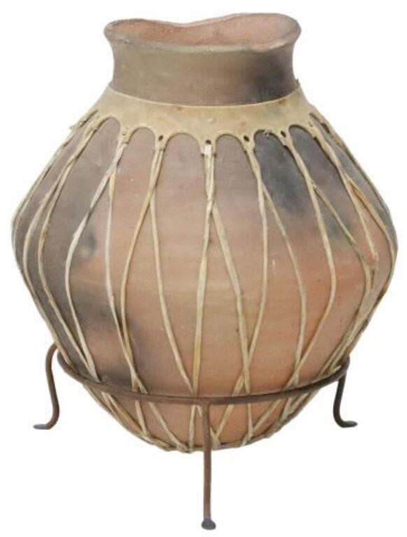 Appraisal: Terracotta olla vessel Tarahumara people Mexico with rawhide lacing to