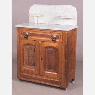 Appraisal: A Victorian Walnut and Marble Washstand th Century A Victorian