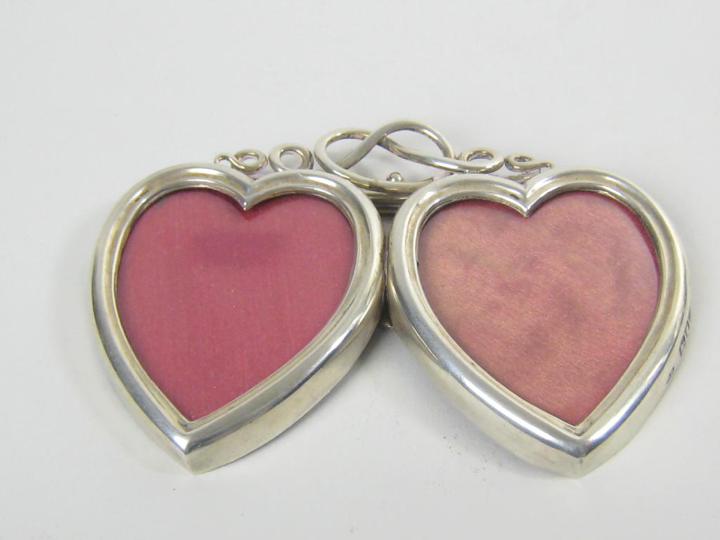 Appraisal: A Victorian small double heart shape Photograph Frame London