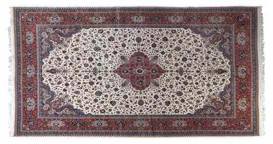 Appraisal: A Kashan Wool Rug having allover foliate decoration on an