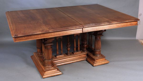 Appraisal: th Century Italian walnut dining table with fluted column base