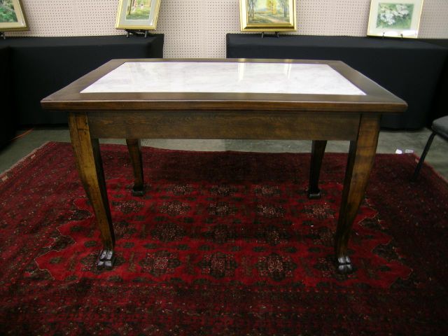 Appraisal: 's marble top tavern table with carved paw feet x