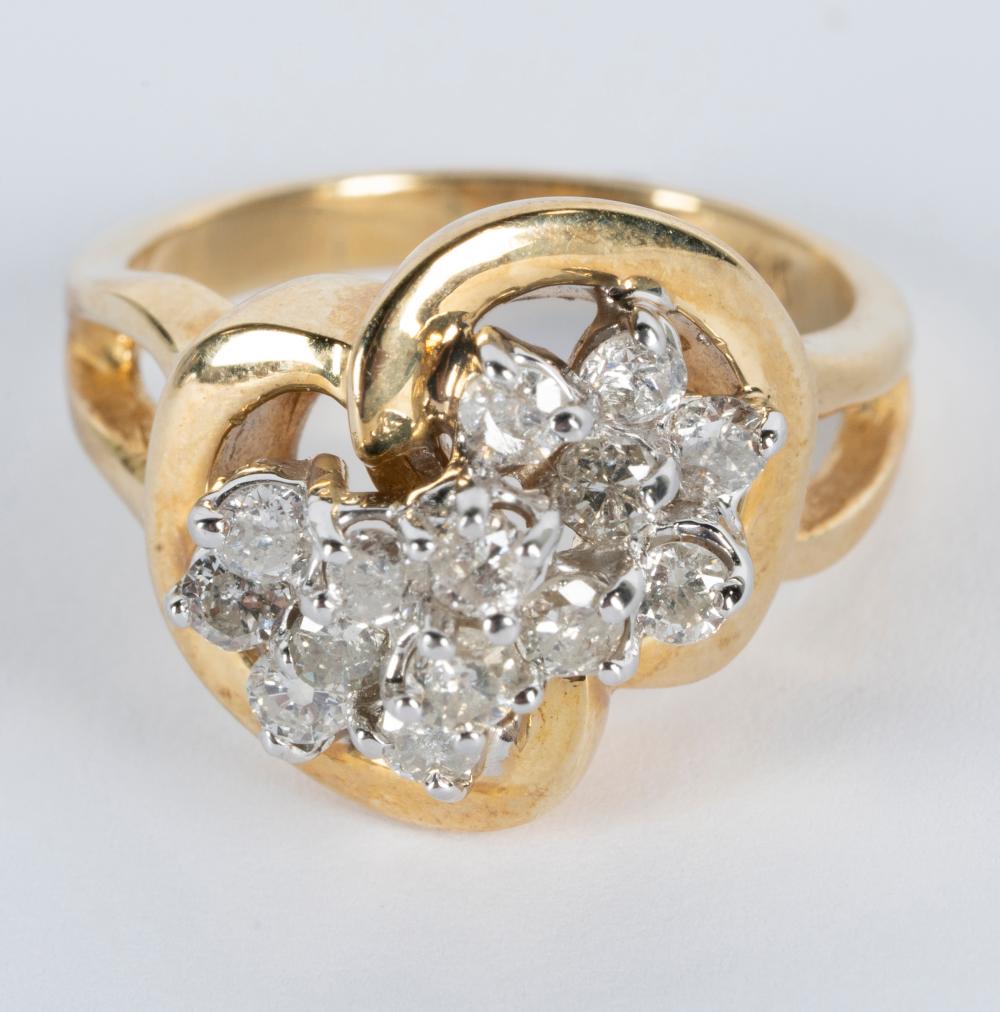 Appraisal: KARAT YELLOW GOLD DIAMOND CLUSTER RINGset with full-cut round diamonds