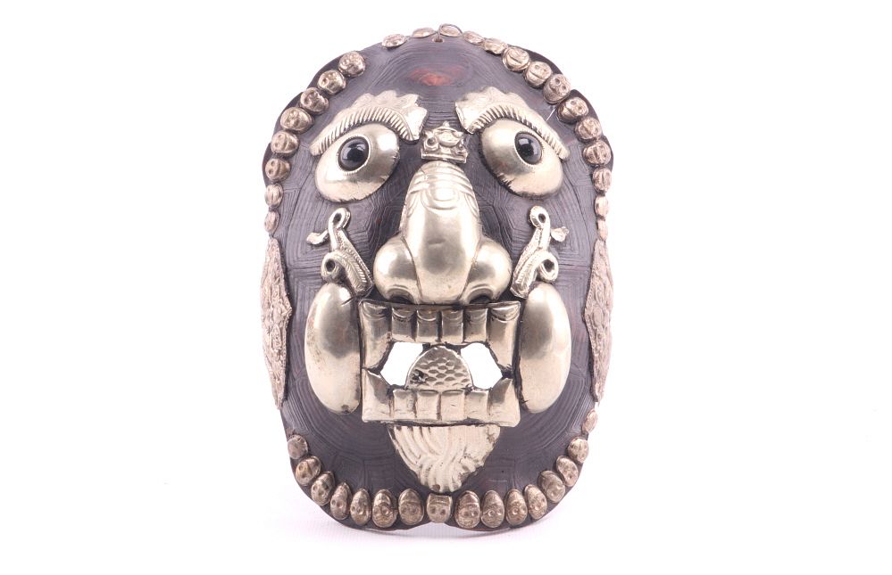 Appraisal: Kapala Tibetan Silver Turtle Shell Embossed Mask Featured in this