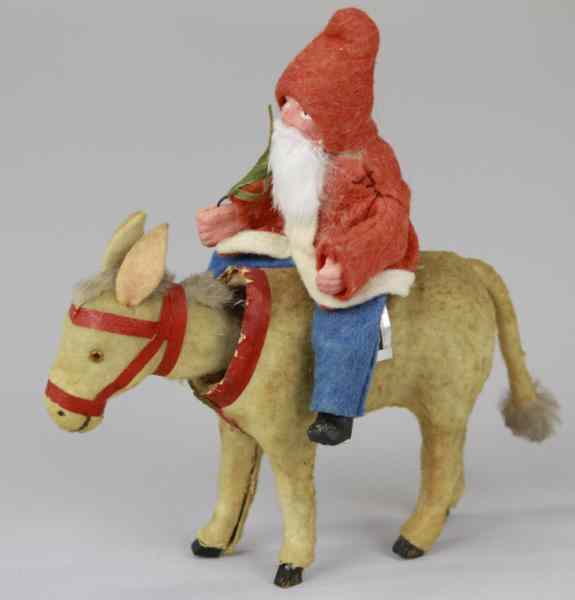 Appraisal: SANTA ON DONKEY NODDER Germany Santa in red coat trimmed