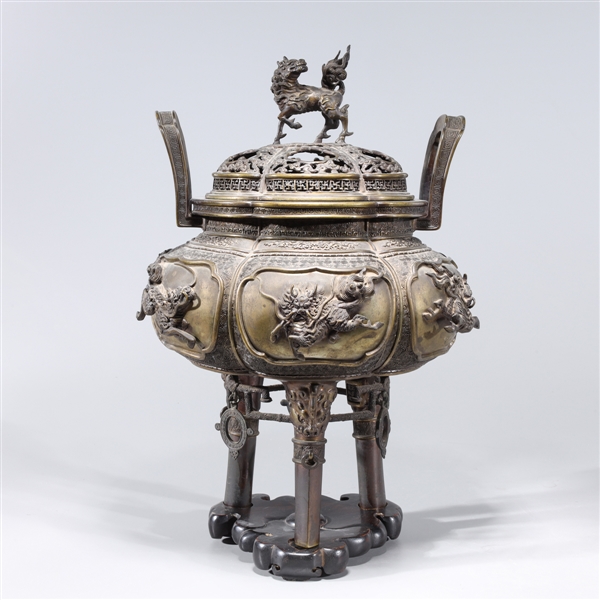 Appraisal: Large and elaborate Chinese bronze covered censer with Qilin and