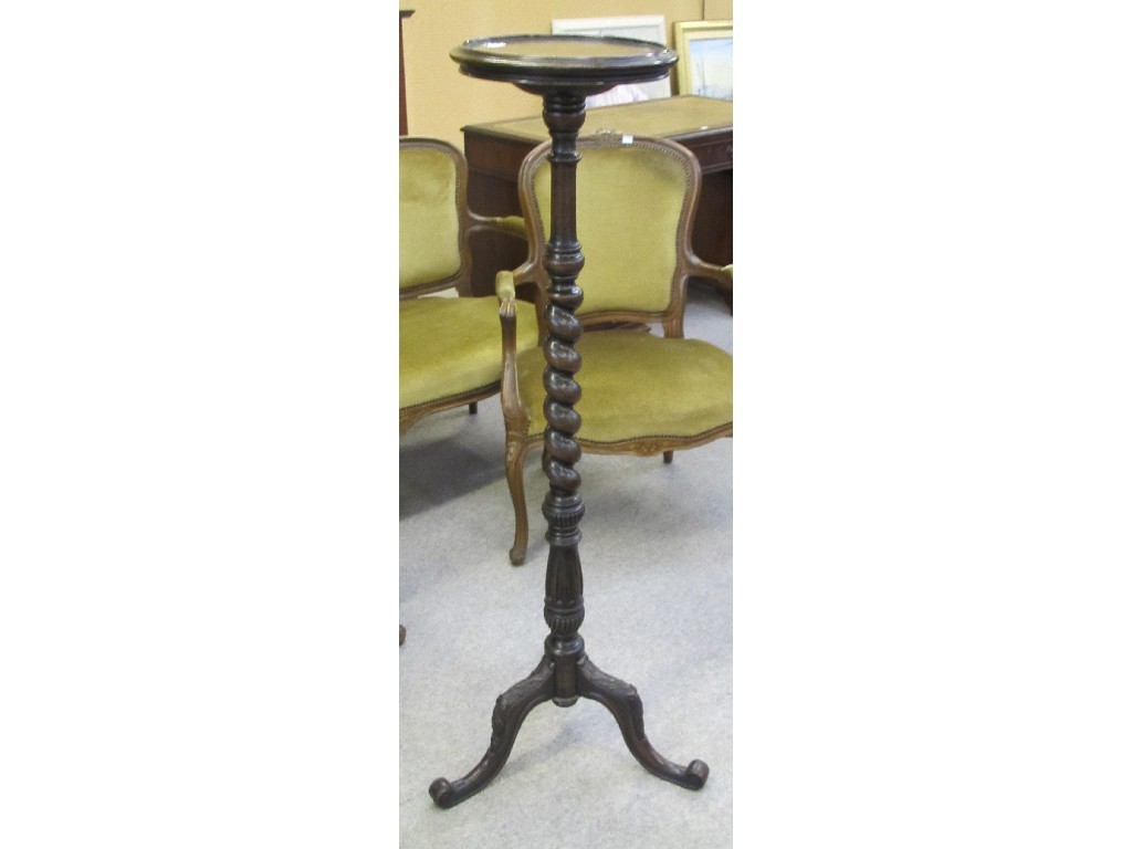 Appraisal: Mahogany torchere raised on a carved tripod base