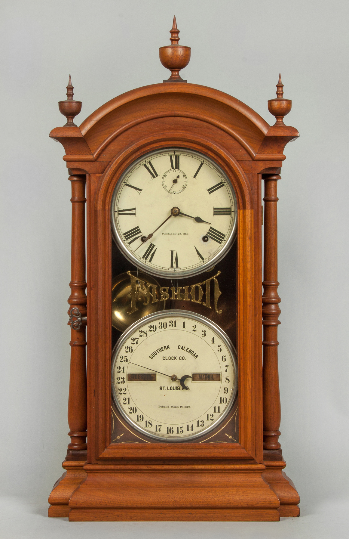 Appraisal: Southern Calendar Fashion Clock Walnut case Original dials Original glass