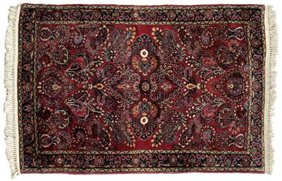 Appraisal: Sarouk rug floral designs on burgundy field s- s ft