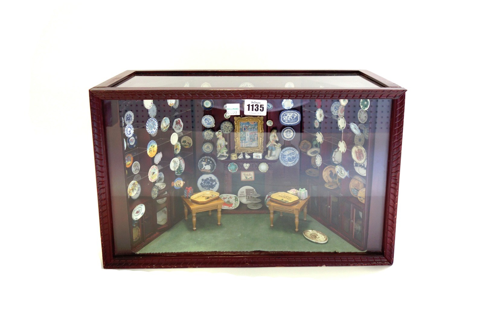 Appraisal: A miniature interior scene mid th century modelled as a