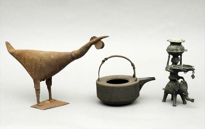 Appraisal: Japanese Iron Teapot Together with an Indian figural oil lamp