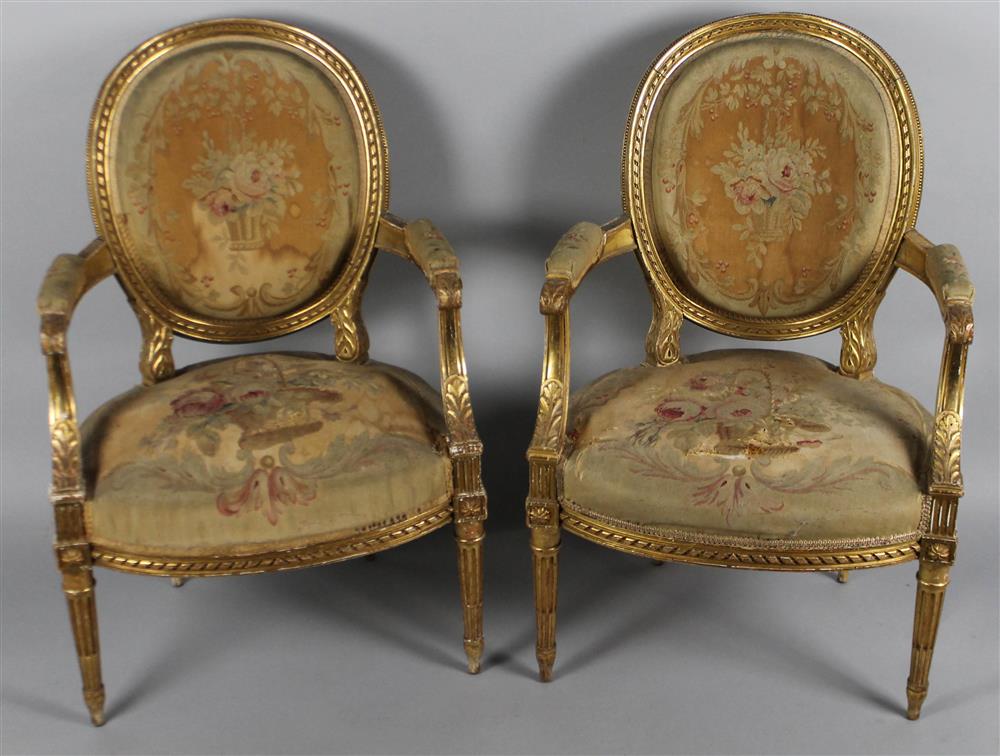 Appraisal: PAIR OF LOUIS XVI CARVED AND GILDED FAUTEUILS each having