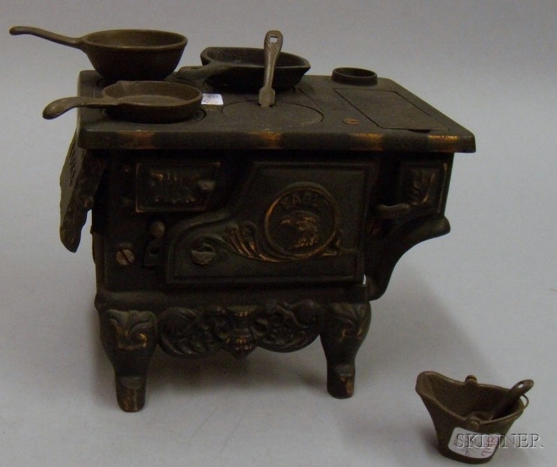 Appraisal: Eagle Cast Iron Toy Cooking Range th century with copper