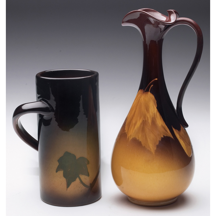 Appraisal: Rookwood handled vessel cylindrical shape with a grape design Carrie