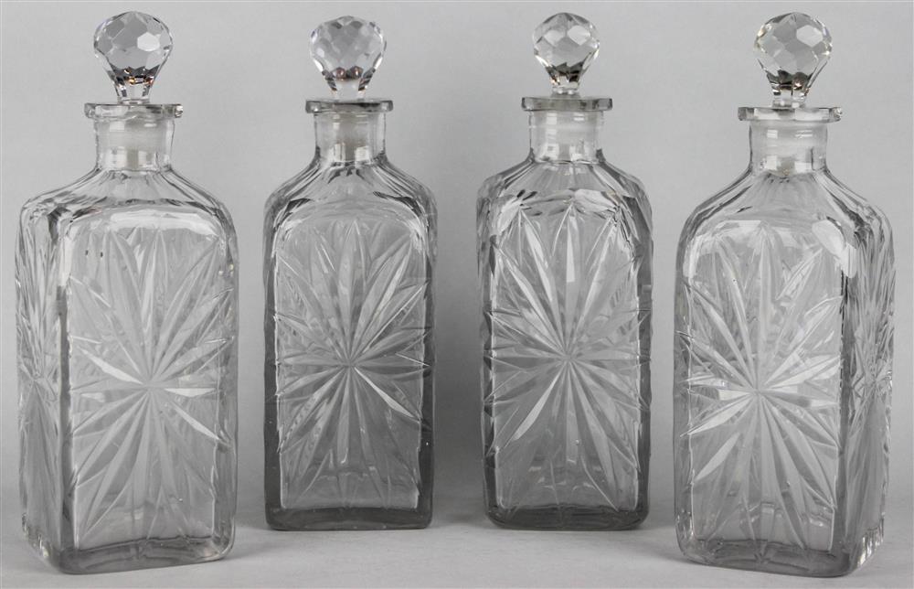 Appraisal: FOUR ENGLISH CUT GLASS BLOCK-FORM DECANTERS AND STOPPERS early th