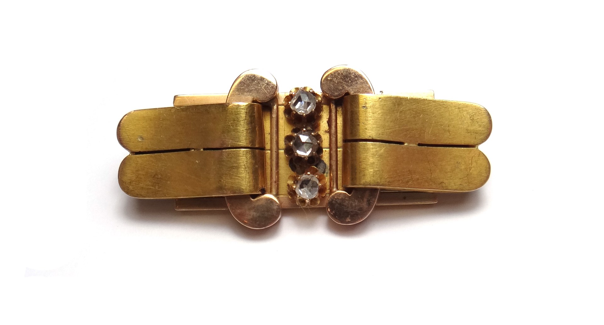 Appraisal: A gold and rose diamond set brooch in a panel