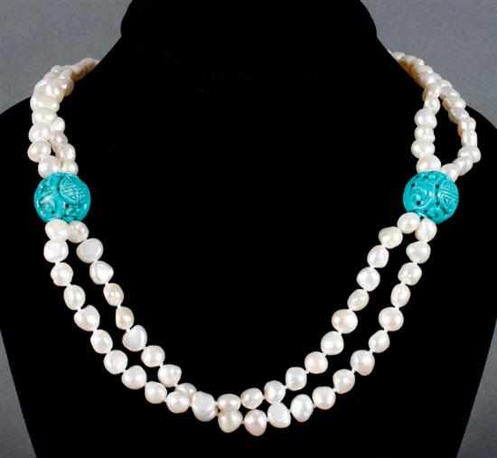 Appraisal: Lady's cultured baroque pearl and carved turquoise double strand necklace