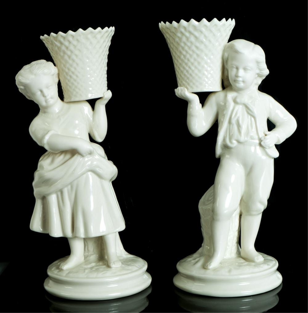 Appraisal: PAIR BELLEEK BISQUE PORCELAIN FIGURAL SPILL VASESPair of Irish Belleek