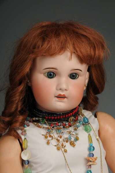 Appraisal: Very Large SFBJ Child Doll Description Blue sleeping eyes replaced