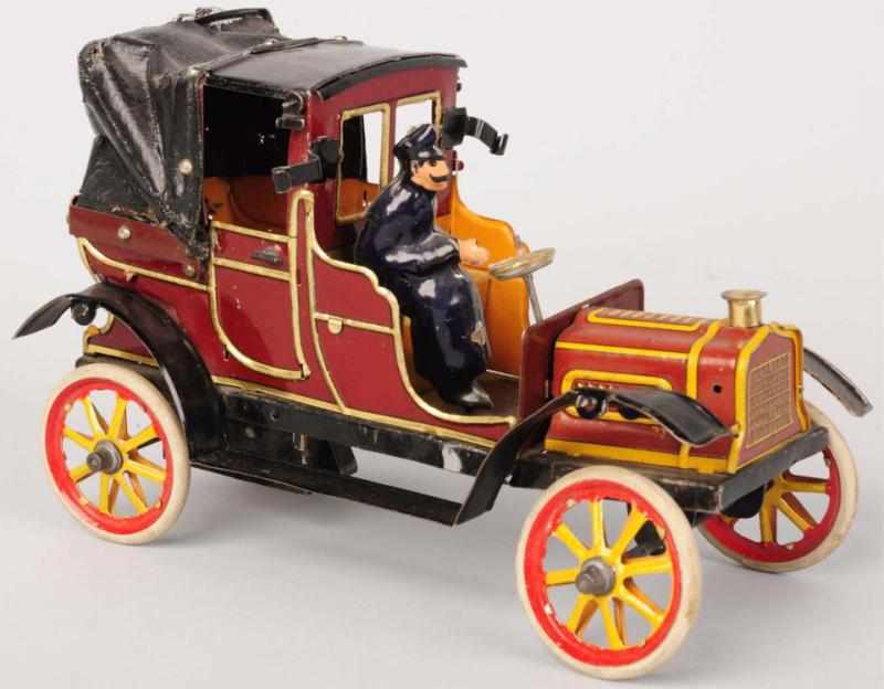 Appraisal: Tin Litho Fisher Automobile Wind-Up Toy German Working Original driver