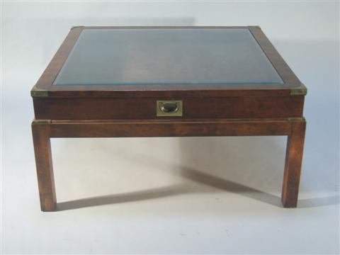 Appraisal: CAMPAIGN STYLE VITRINE DISPLAY COFFEE TABLE The rectangular top inset