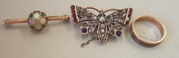 Appraisal: A rose diamond ruby and gem set brooch designed as