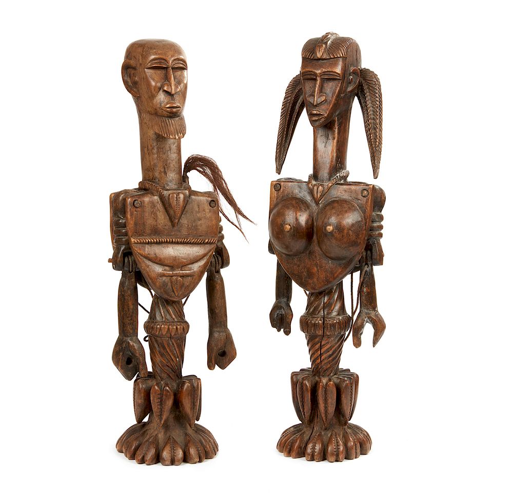 Appraisal: Two Standing West African Wood Figures Two standing West African