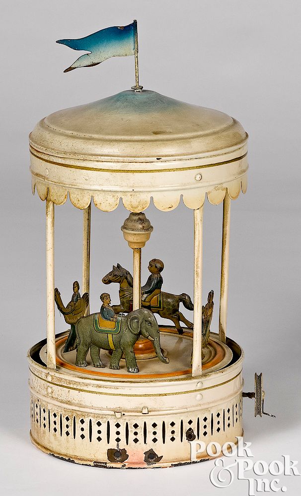 Appraisal: Bing carousel steam toy accessory and Bing painted tin carousel