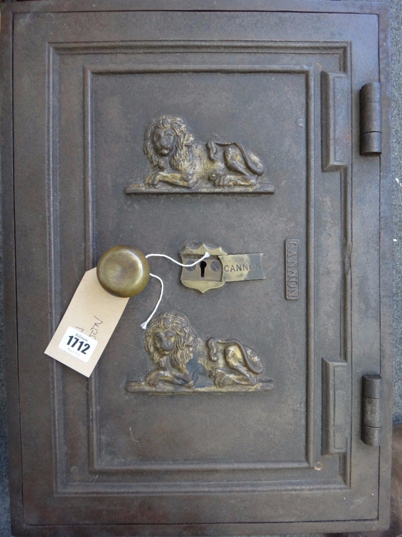 Appraisal: An early th century cast iron strongbox with gilt lion