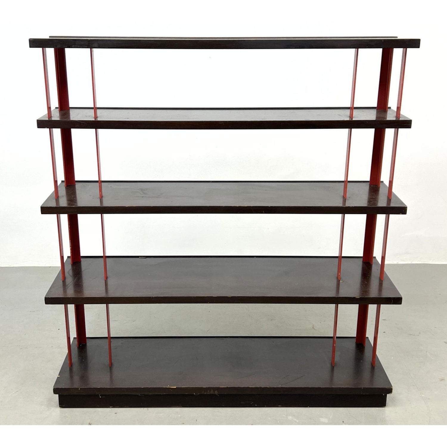 Appraisal: Art Deco Ebonized Bookcase Red Riser accents Dimensions H inches